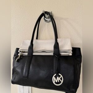 Michael Kors black and white hand bag.
